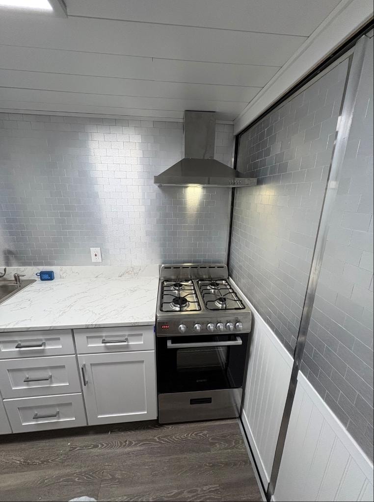 Panoramic view of full trailer kitchen interior