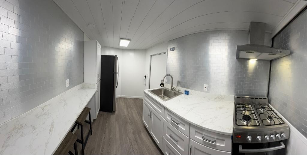 Refrigerator, sink, and counter workspace